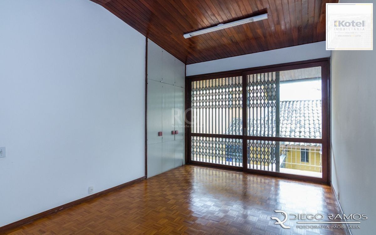 Venda de casa residencial 25,00m x 80,00m- Menino Deus. 4 vagas, 4 dormitórios, sendo 1 suíte, 1 varanda, lareira e churrasqueira. — foto 5