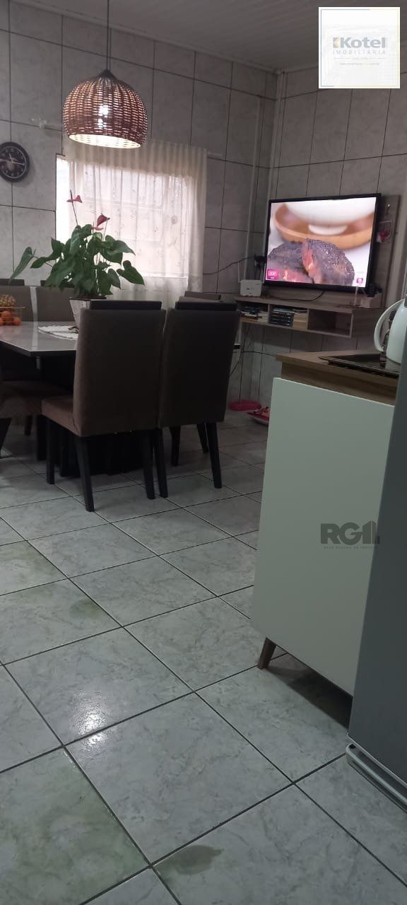 Convido você a conhecer esta encantadora casa, localizada em Gravataí/RS.