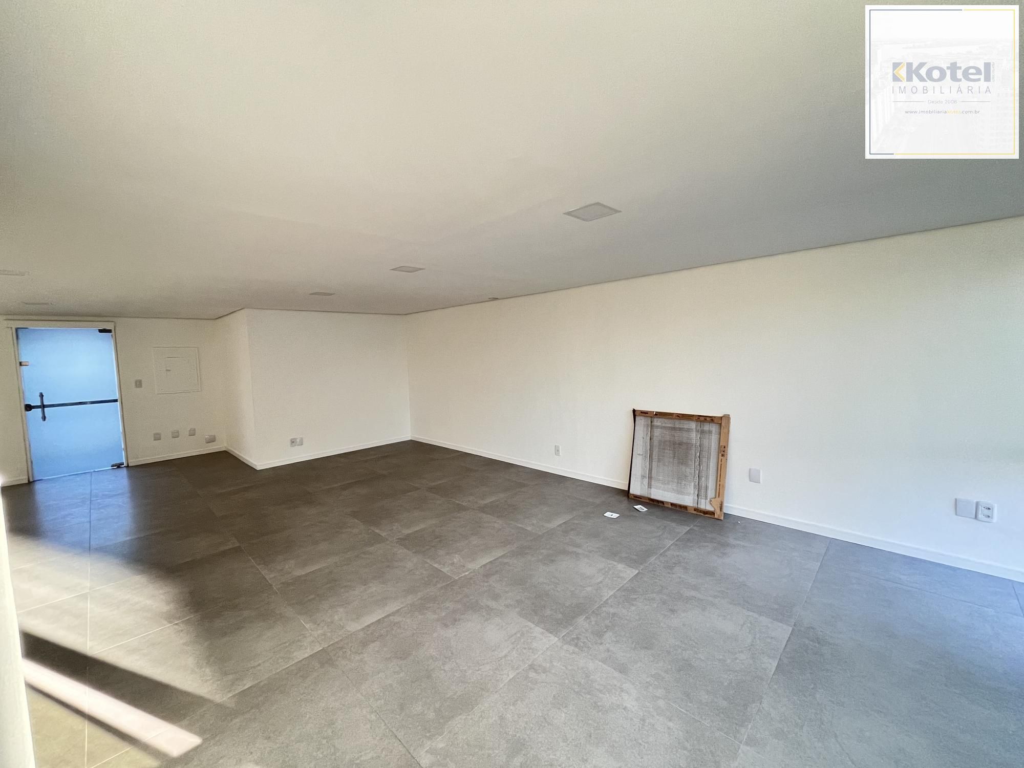 Sala comercial com uma vaga de garagem