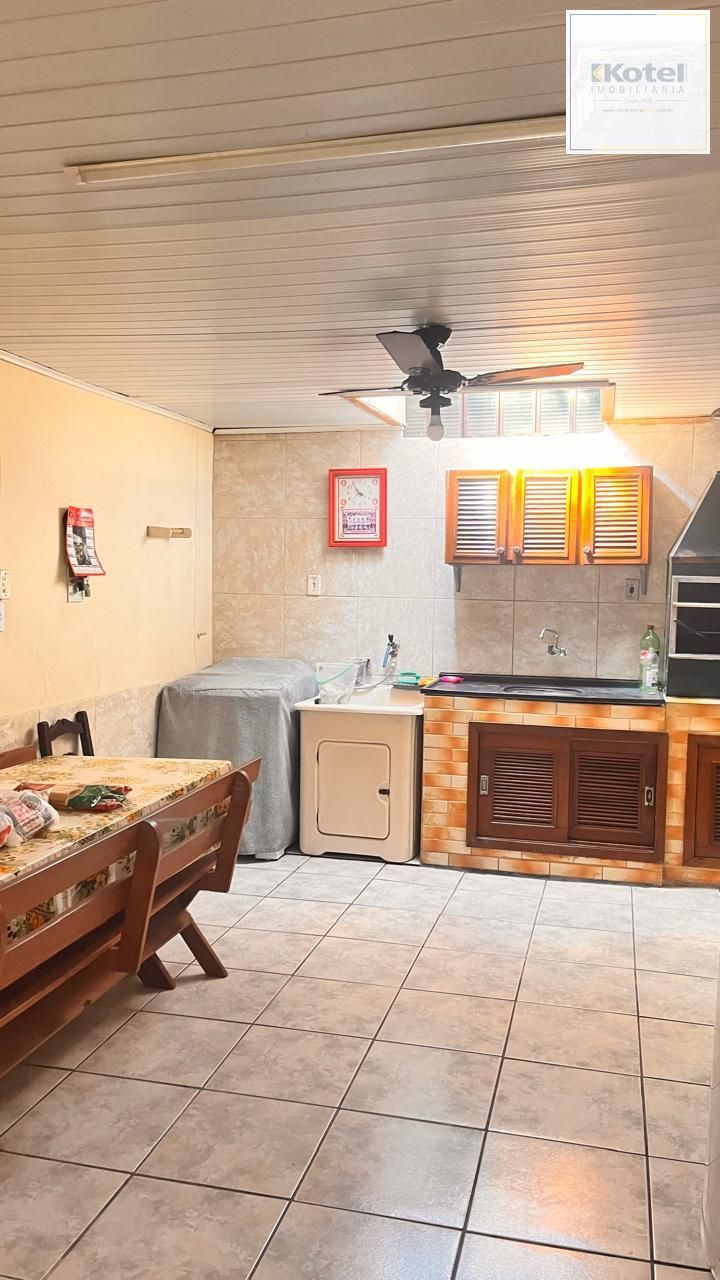 Casa térrea de 3 dormitórios, 3 vagas, churrasqueira pátio no bairro Ruben Berta — foto 4