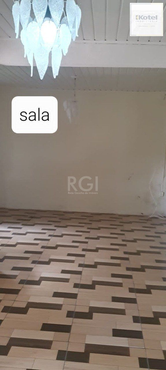 Casa 2 dormitórios, 1 suíte, vaga de garagem, Bairro Nova Cachoeirinha