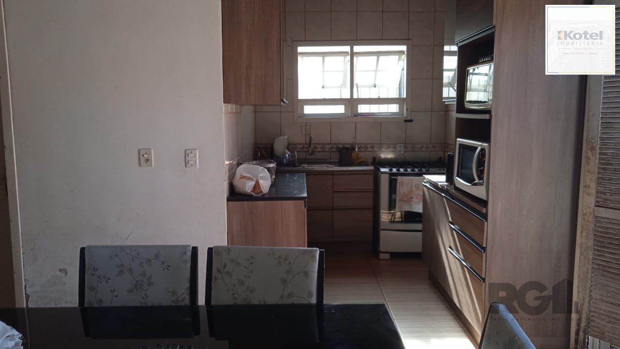 Casa 3 dormitórios, vagas de garagem, Bairro Vila Cachoeirinha