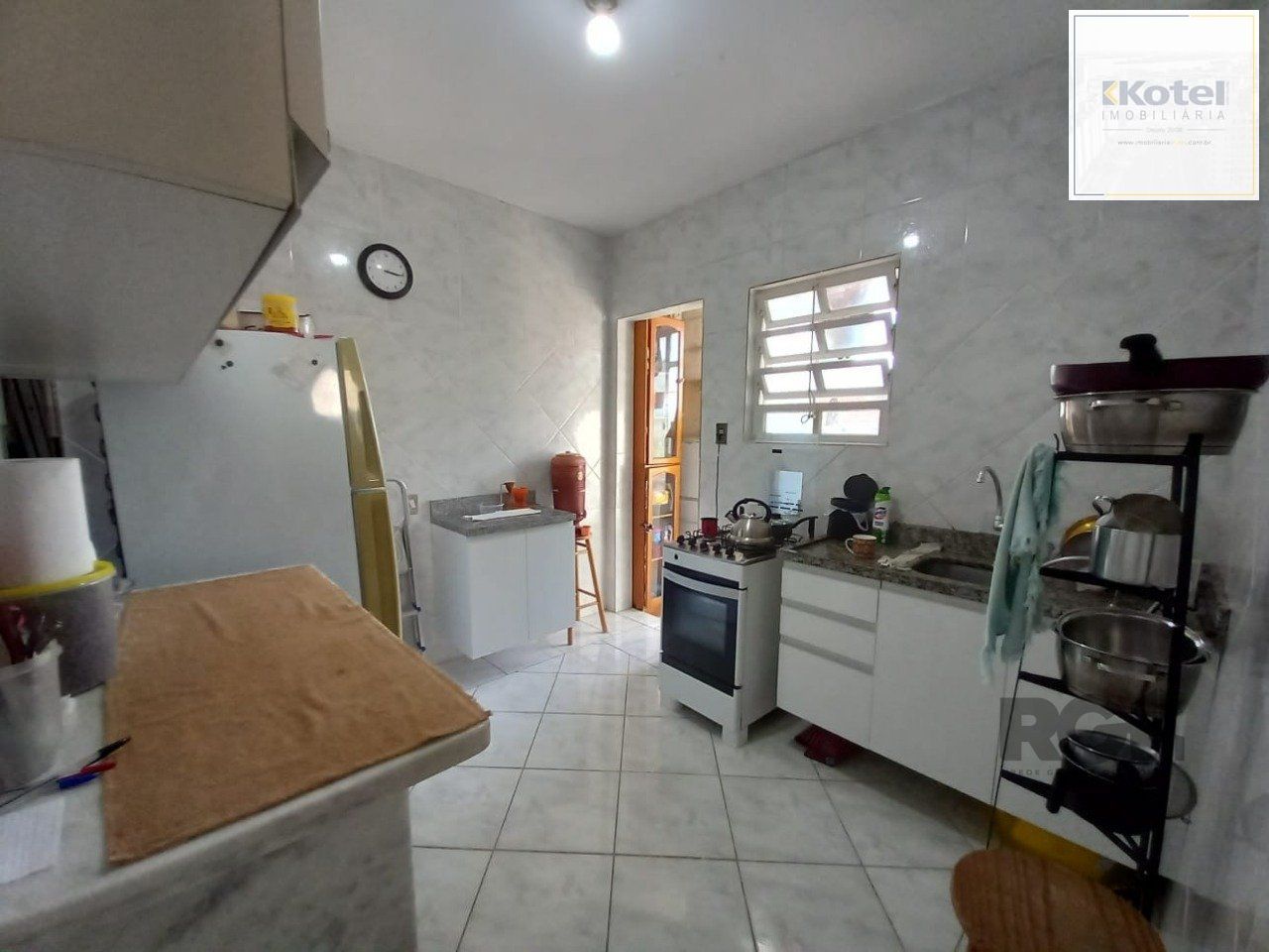 Apartamento 3 dormitórios com casa nos fundos — foto 4