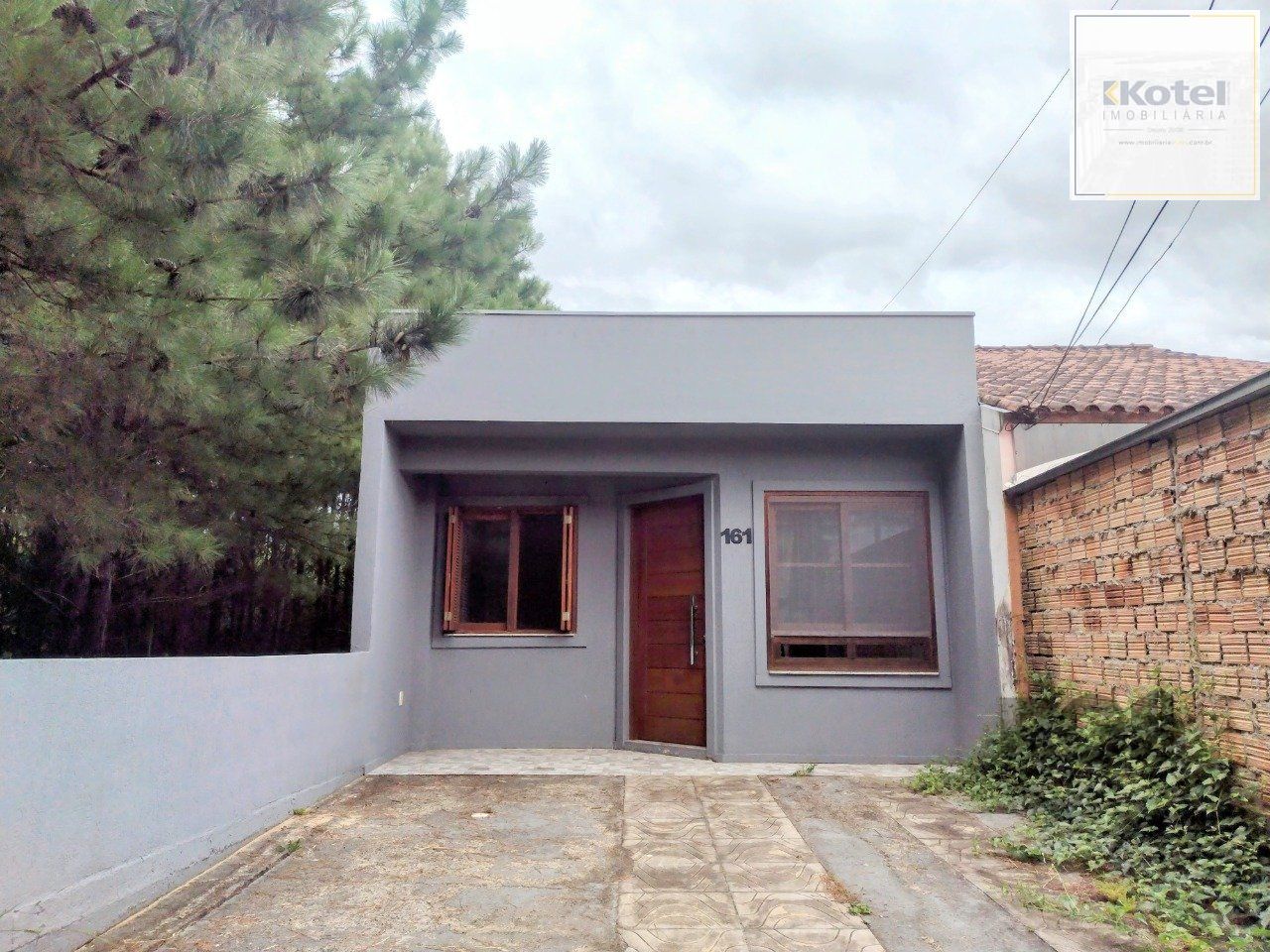 CASA TÉRREA - 2 DORMITÓRIOS, ÁREA COBERTA COM CHURRASQUEIRA , TERRAÇO - 02 VAGAS — foto 2