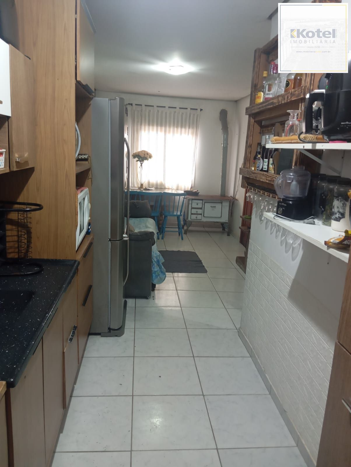 Casa 2 dormitórios com vaga de garagem, bairro Ponta Grossa, Porto Alegre