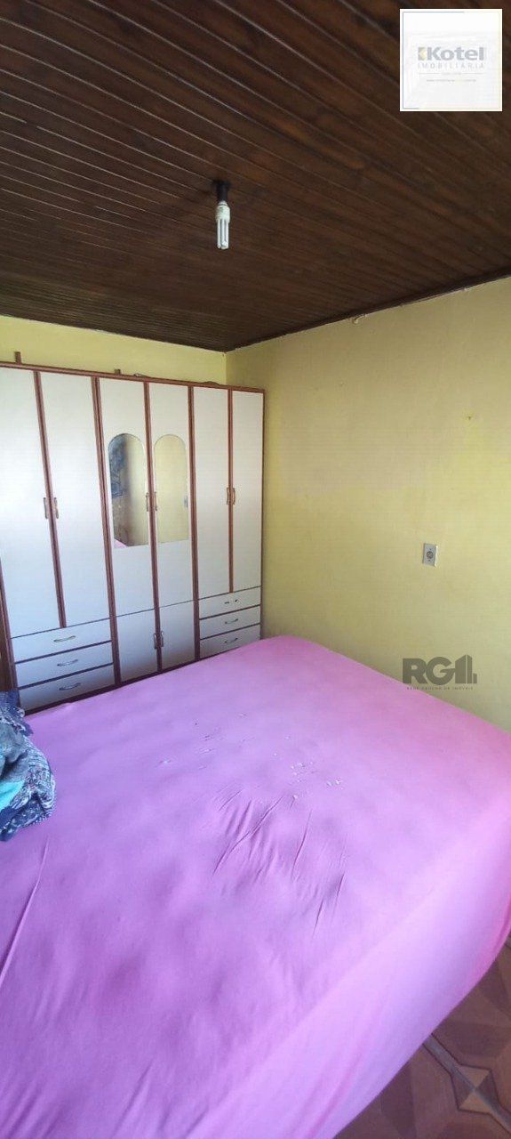 Oportunidade na zona sul, terreno com duas casas, 03 dormitórios  e cozinha com churrasqueira. — foto 5