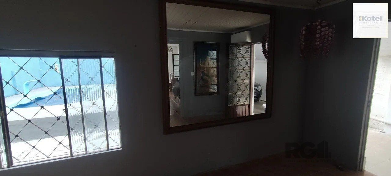 Casa com 2 quartos, vagas de garagem, piscina,  bairro Sarandi, Porto Alegre/RS — foto 2