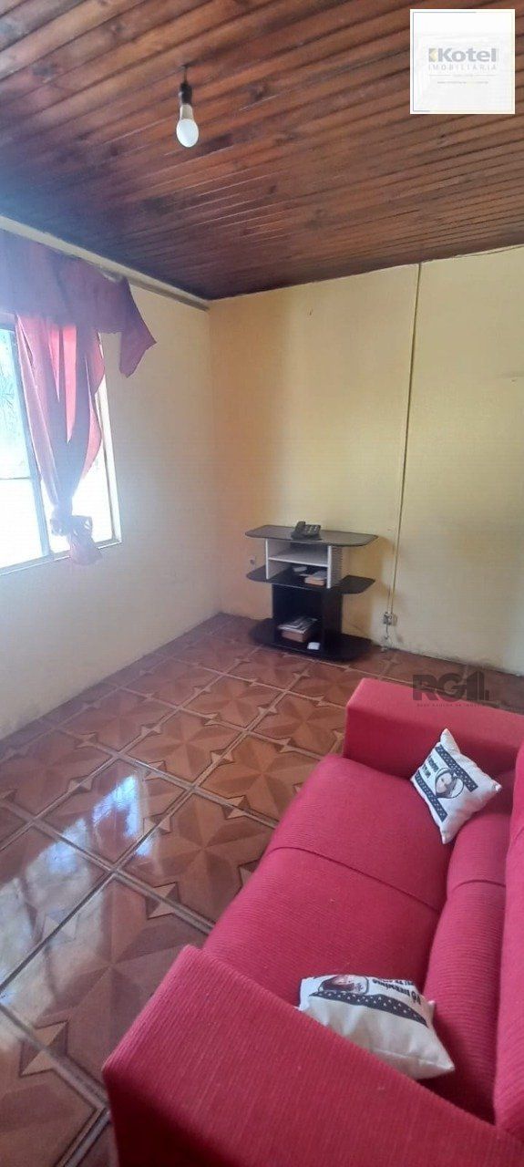 Oportunidade na zona sul, terreno com duas casas, 03 dormitórios  e cozinha com churrasqueira. — foto 4