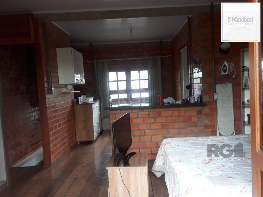 Casa com 3 dormitórios, sendo 1 suíte no bairro Hípica — foto 5