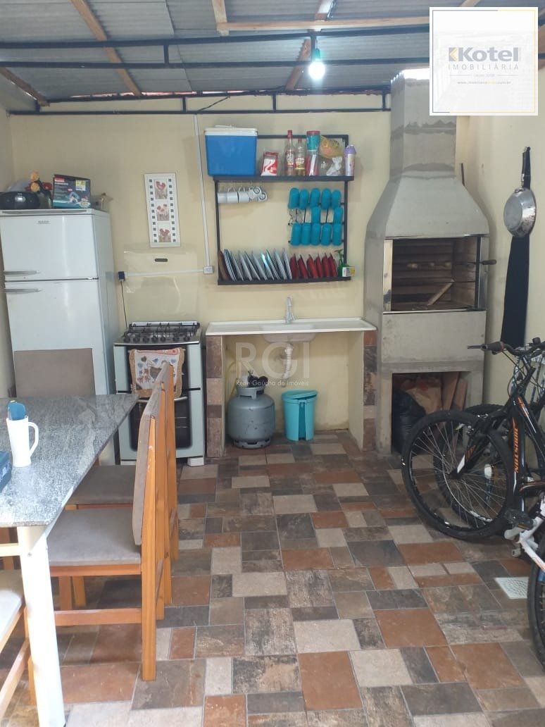 Casa com 2 quartos, banheiro, área de serviço, cozinha, vaga de garagem, no bairro Aberta dos Morros/RS — foto 3