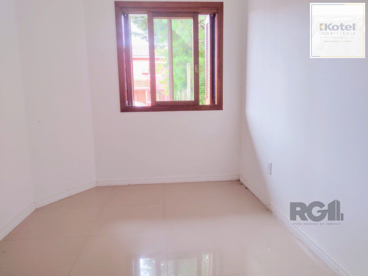 CASA TÉRREA - 2 DORMITÓRIOS, ÁREA COBERTA COM CHURRASQUEIRA , TERRAÇO - 02 VAGAS — foto 5