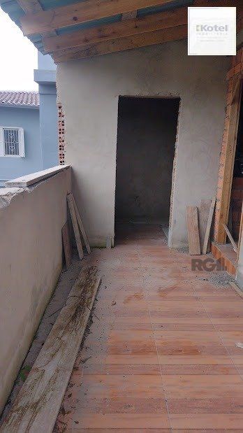 Casa de dois dormitórios localizada no Bairro Nonoai — foto 2