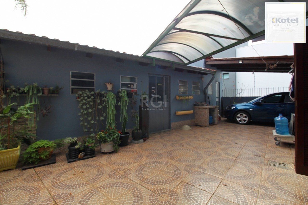 Casa para Venda - 339m², 3 dormitórios, 2 vagas - Vila Nova, Porto Alegre