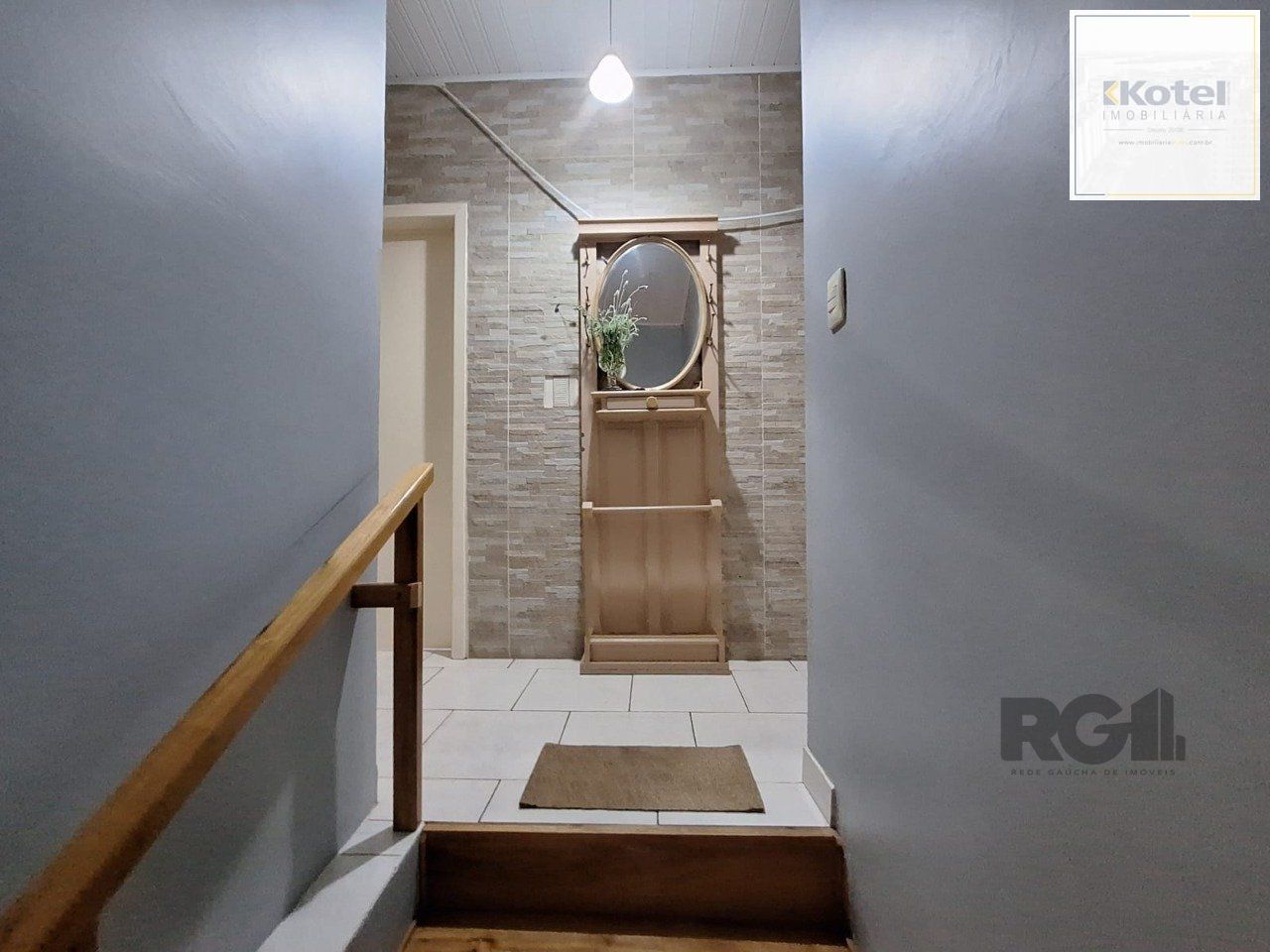 Casa com 3 dormitórios, suíte, lareira, Jardim Algarve em Alvorada - RS.