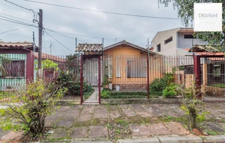 Casa de 3 dormitórios , com suíte , banheiro social , 2 apartamentos de 1 dormitório nos fundos ,vaga para 3 carros ! — foto 2