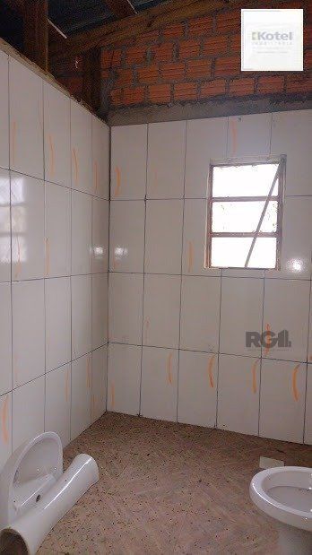 Casa de dois dormitórios localizada no Bairro Nonoai — foto 5