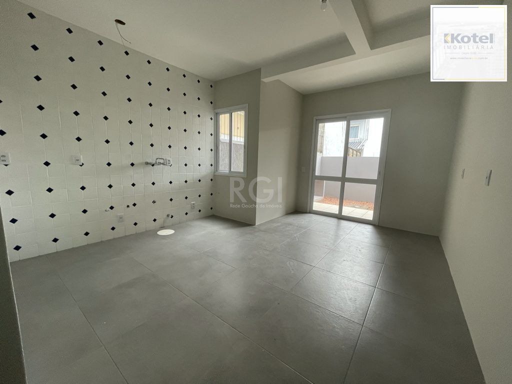 Casa 3 dormitórios, sendo 1 suites, 2 vagas - Guarujá, Porto Alegre RS — foto 5