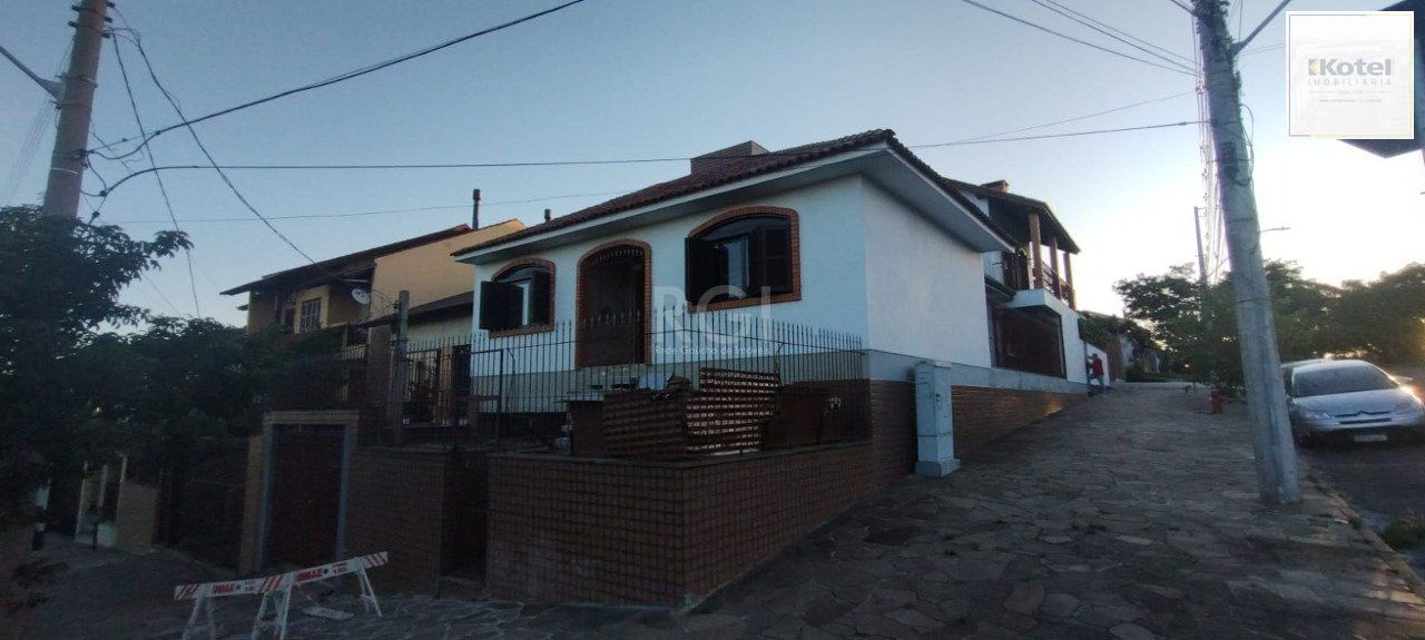 Casa de 4 dormitórios no bairro Parque Santa Fé — foto 2