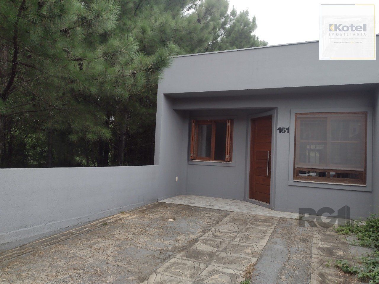 CASA TÉRREA - 2 DORMITÓRIOS, ÁREA COBERTA COM CHURRASQUEIRA , TERRAÇO - 02 VAGAS — foto 3