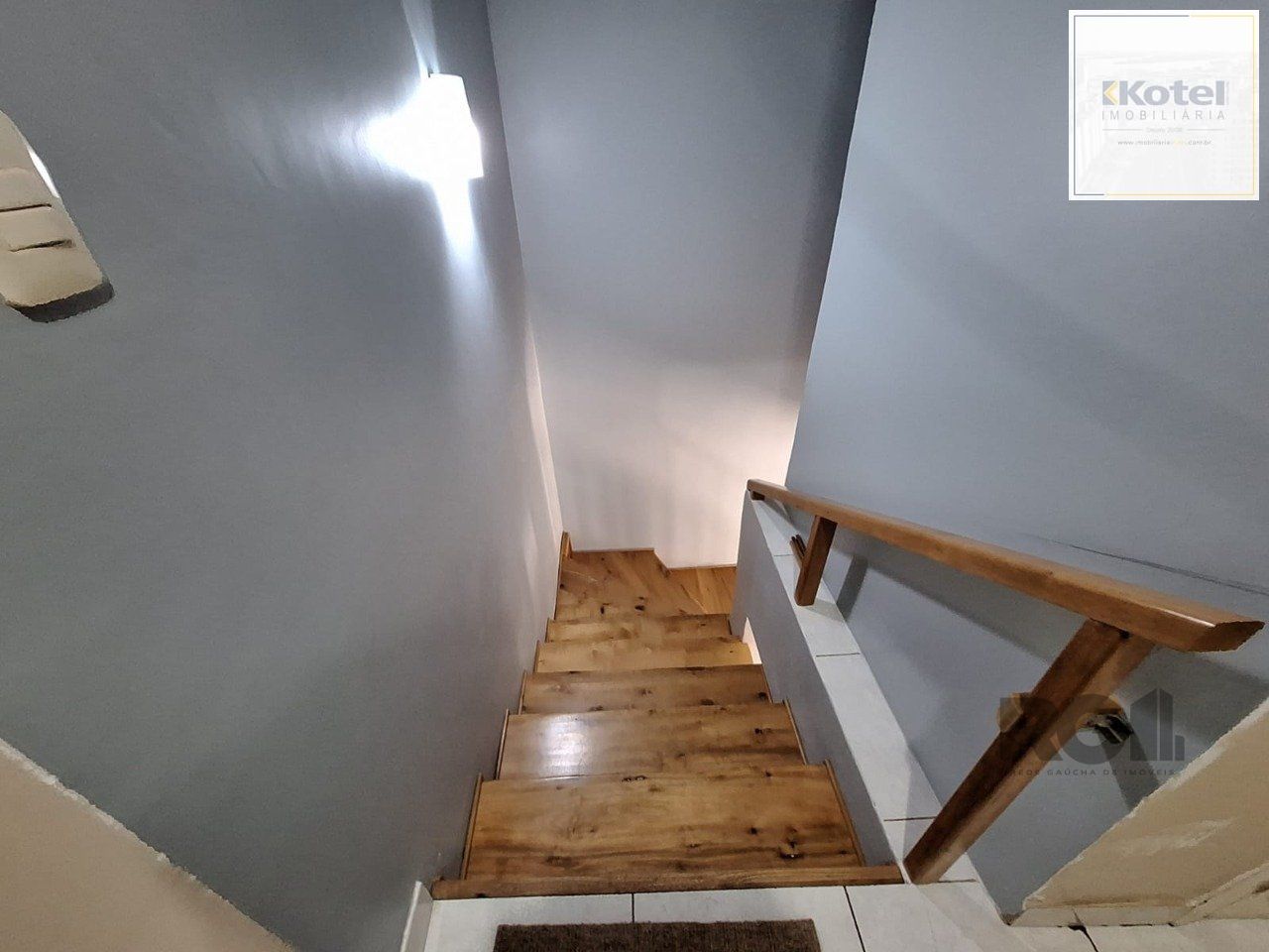 Casa com 3 dormitórios, suíte, lareira, Jardim Algarve em Alvorada - RS.