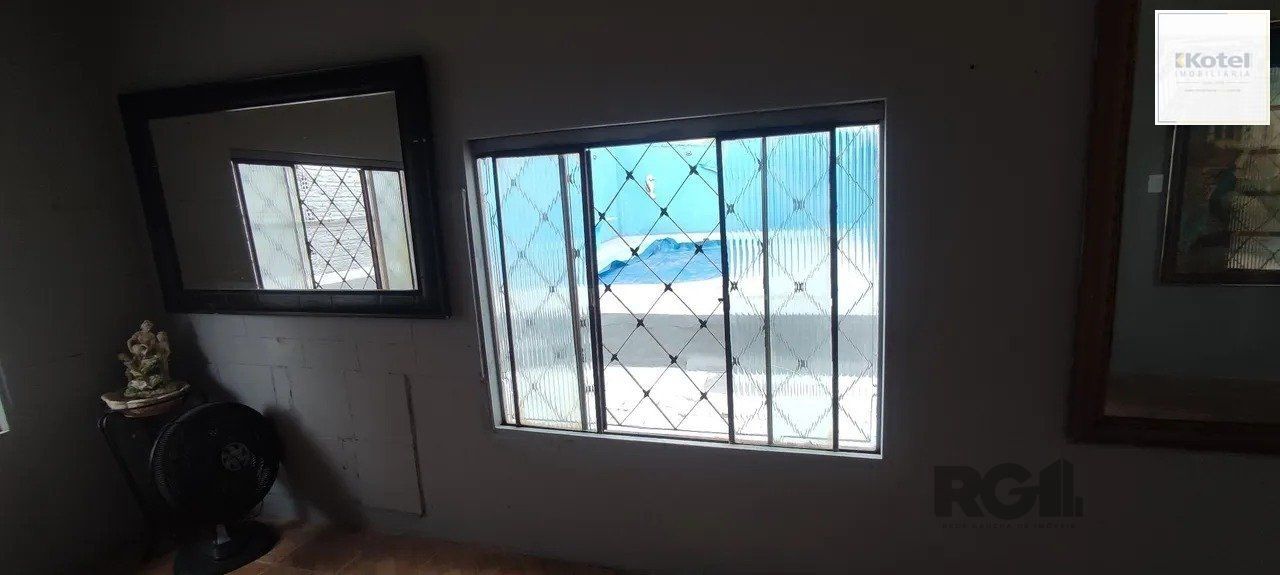 Casa com 2 quartos, vagas de garagem, piscina,  bairro Sarandi, Porto Alegre/RS — foto 3