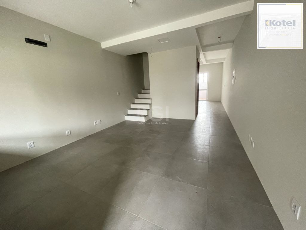 Casa 3 dormitórios, sendo 1 suites, 2 vagas - Guarujá, Porto Alegre RS — foto 2