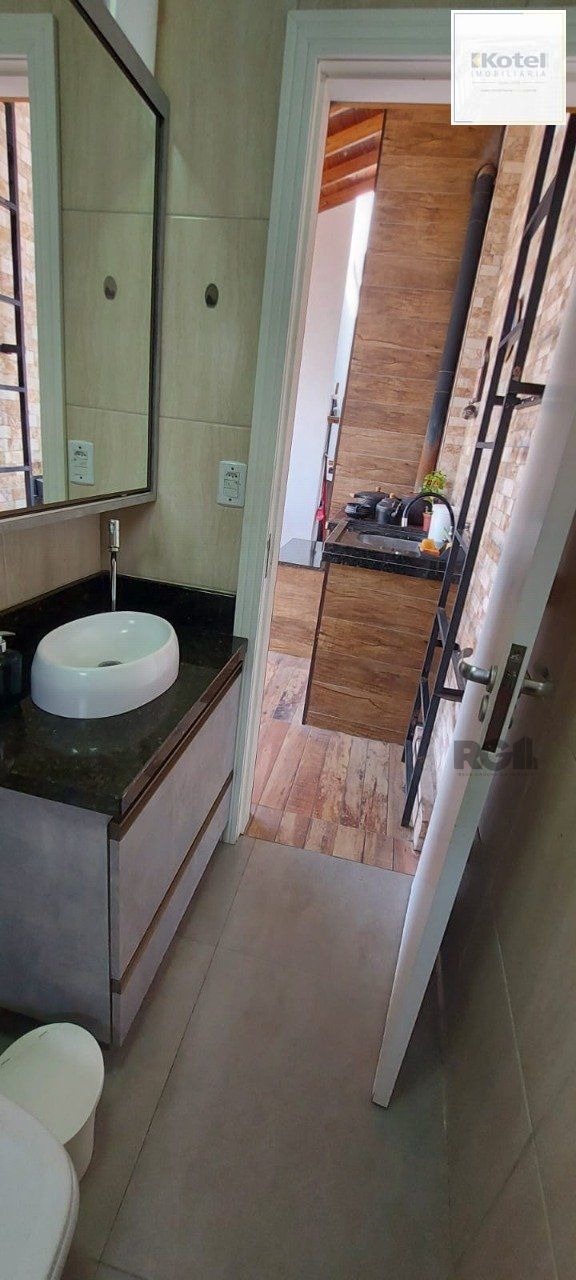 Casa com 2 dormitórios, sendo 1 suíte no bairro Florida em Guaíba