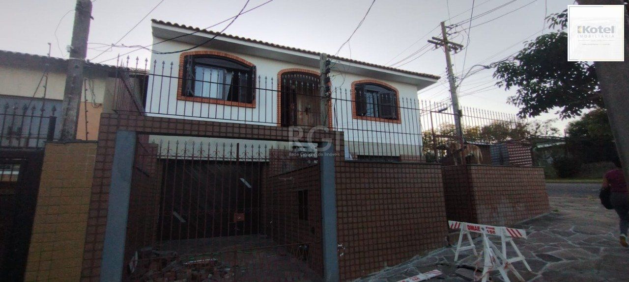Casa de 4 dormitórios no bairro Parque Santa Fé — foto 4
