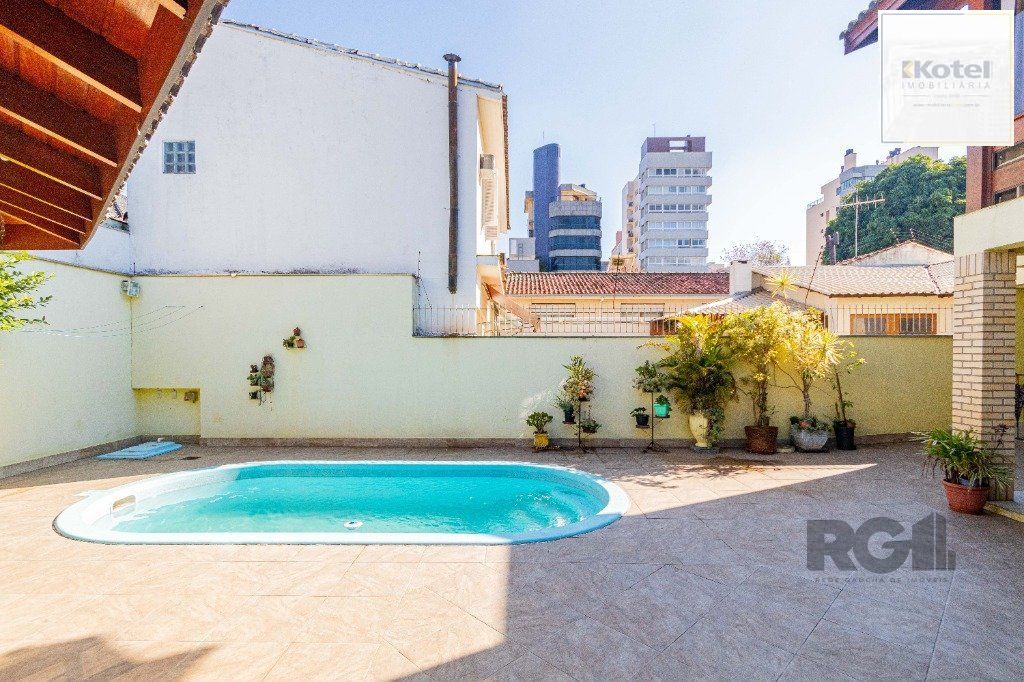 Casa de 4 dormitórios 304m² no bairro Jardim Lindóia — foto 3