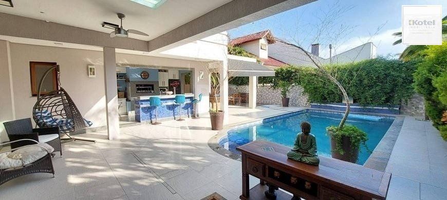 Excelente casa de  386m² com 04 dormitórios sendo 03 suítes. — foto 3