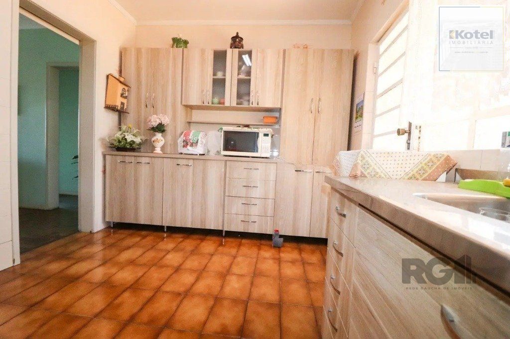 Casa com 3 dormitórios no bairro Cristo Redentor — foto 4