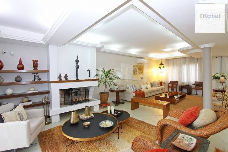 EXCELENTE CASA COM 4 DORMITÓRIOS, 6 VAGAS DE GARAGEM E VISTA PANORÂMICA. — foto 4