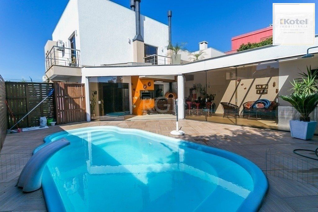 Excelente casa em condomínio com 3 suítes, piscina e 3 vagas de garagem — foto 3