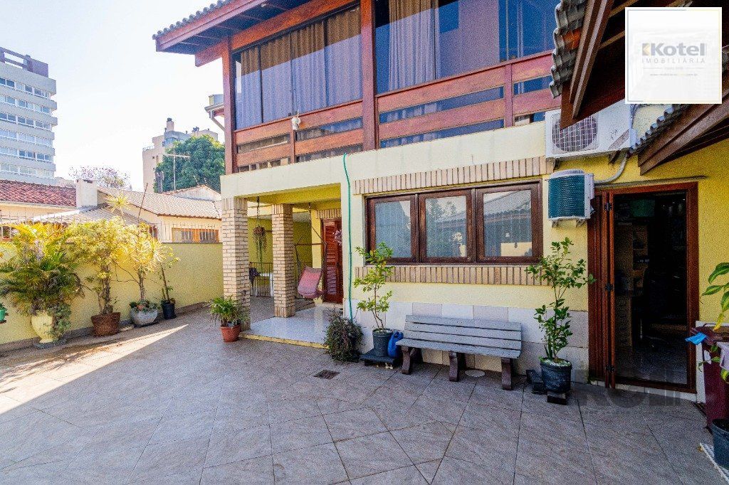 Casa de 4 dormitórios 304m² no bairro Jardim Lindóia — foto 5