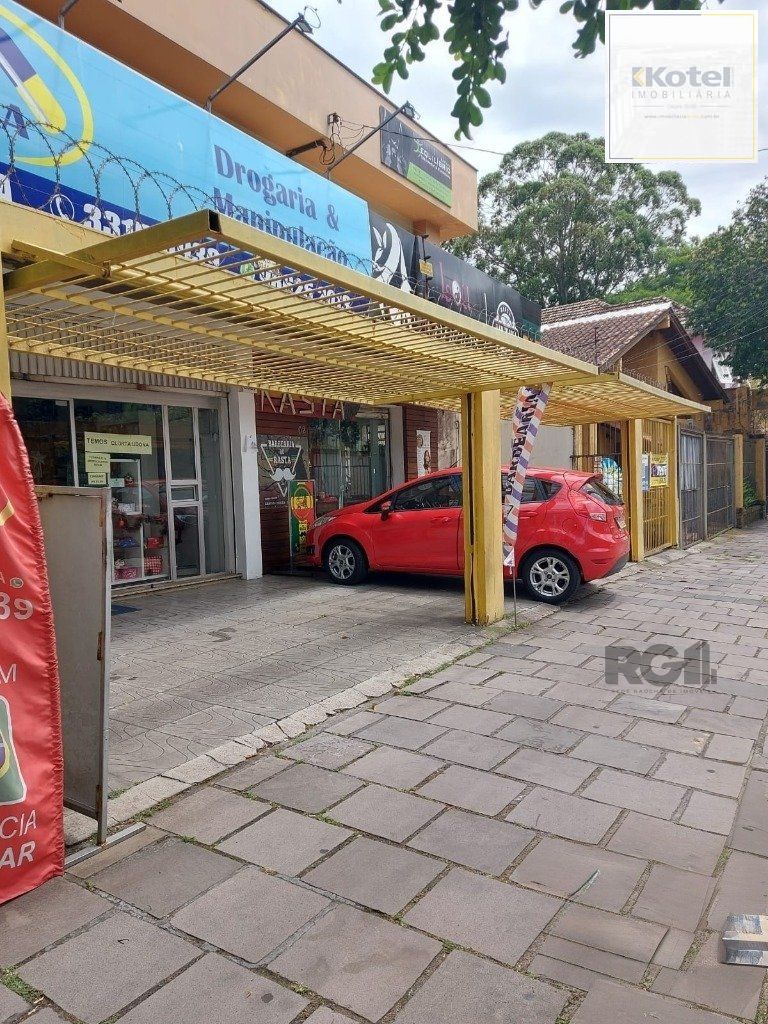 OPORTUNIDADE DE NEGÓCIO!  PONTO COMERCIAL OU RESIDENCIAL,  terreno medindo 13m x 100m, com 02 lojas comercias em frente (atualmente alugadas), nos fundos possui sobrado com 03 dormitórios sendo 01 suí — foto 3