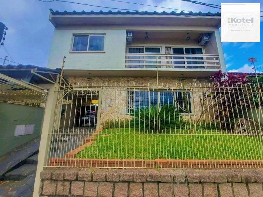 Excelente casa com 3 dormitórios e 3 vagas de garagem — foto 2