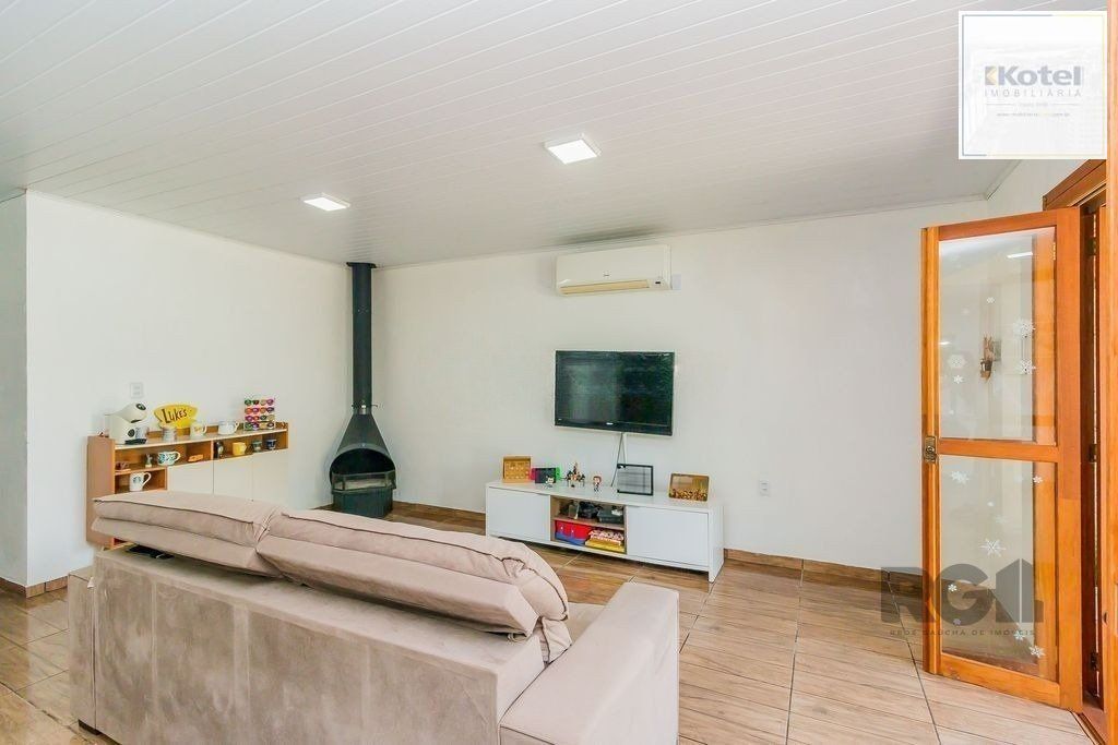 Casa de 2 dormitórios com 98m² no Bairro Lomba do Pinheiro — foto 3