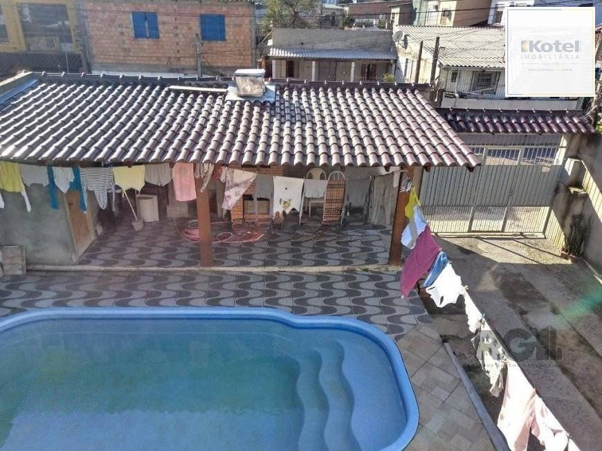 Casa de 191m² com 4 dormitórios, churrasqueira e piscina. — foto 2