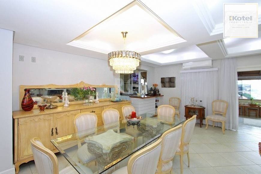 EXCELENTE CASA COM 4 DORMITÓRIOS, 6 VAGAS DE GARAGEM E VISTA PANORÂMICA. — foto 5