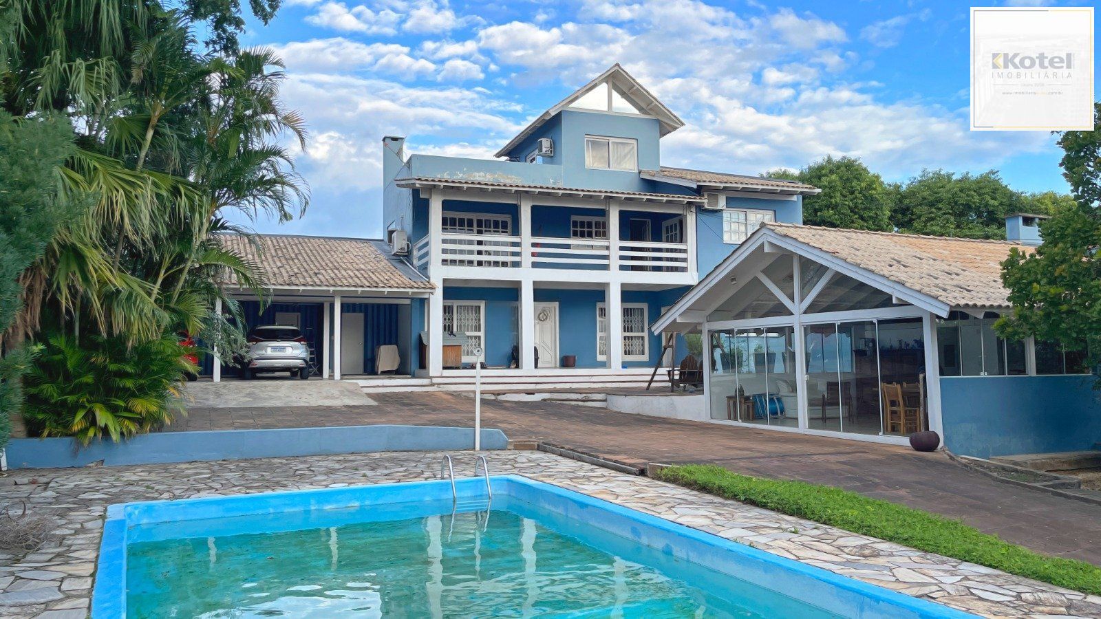 Casa de 5 dormitorios, á venda no bairro Vila Nova, Porto Alegre