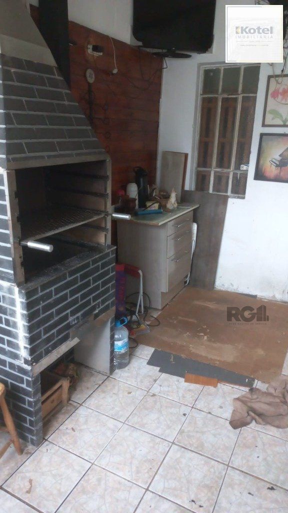 Ampla casa de 180m² com 2 dormitórios e churrasqueira. — foto 4