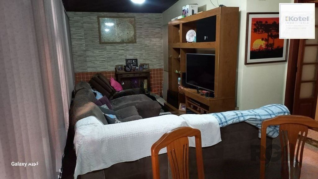 Casa 3 dormitórios no bairro Rubem Berta — foto 2