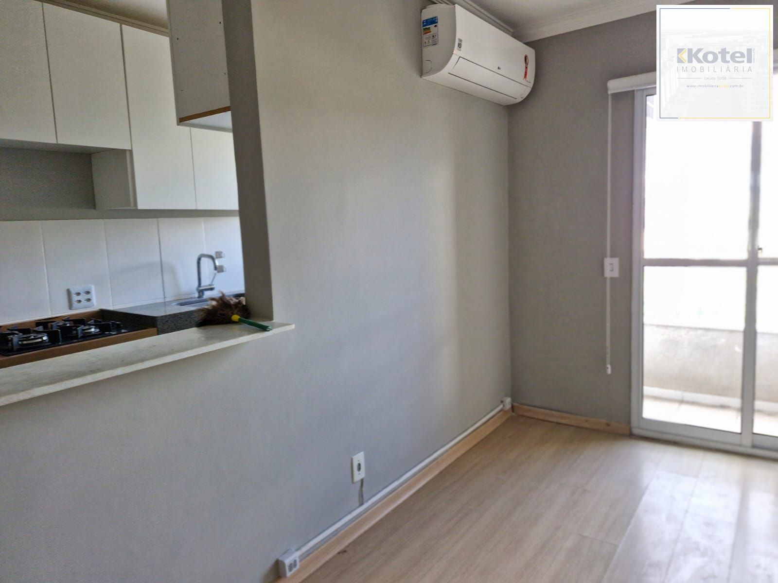 Apartamento de 2 dormitórios sendo 1 suíte, sala cozinha e garagem