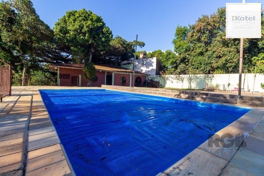 Casa 4 Dormitórios, piscina, bairro Teresópolis — foto 5