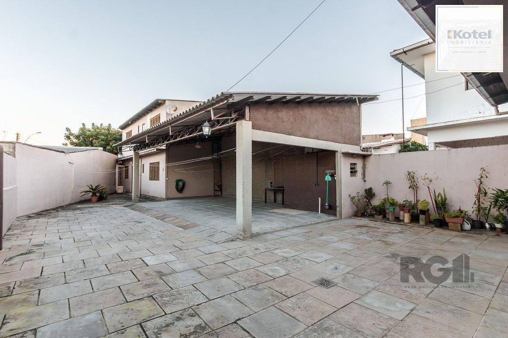 Casa de 4 dormitórios no bairro Santa Rosa de Lima — foto 3