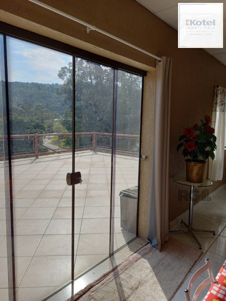 Casa com 4 dormitórios no bairro Vila Nova — foto 3