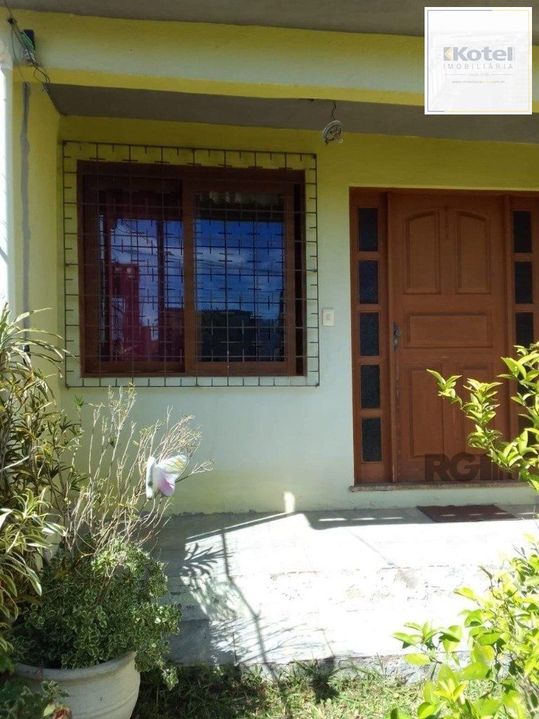 Casa de 4 quartos com 243,58m² no Bairro Lomba do Pinheiro — foto 3