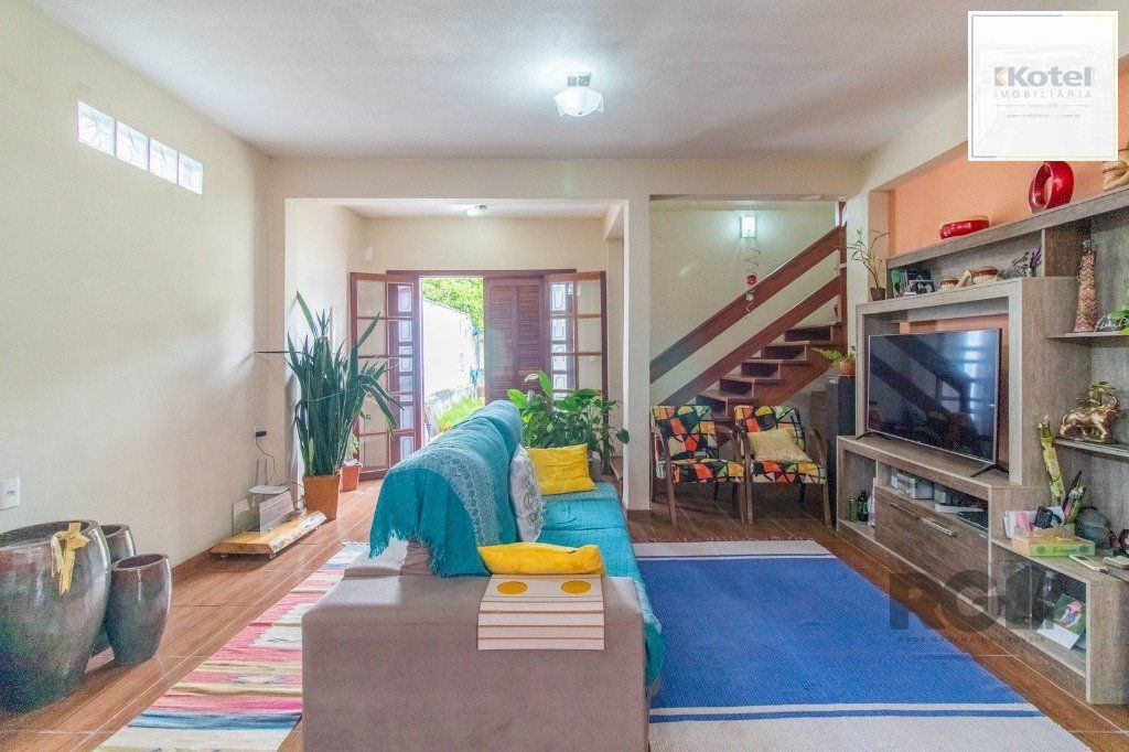Casa com 3 dormitórios e 3 vagas no bairro Santa Tereza — foto 3