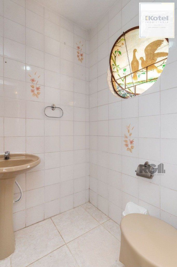 Casa de 4 dormitórios no bairro Camaquã — foto 4