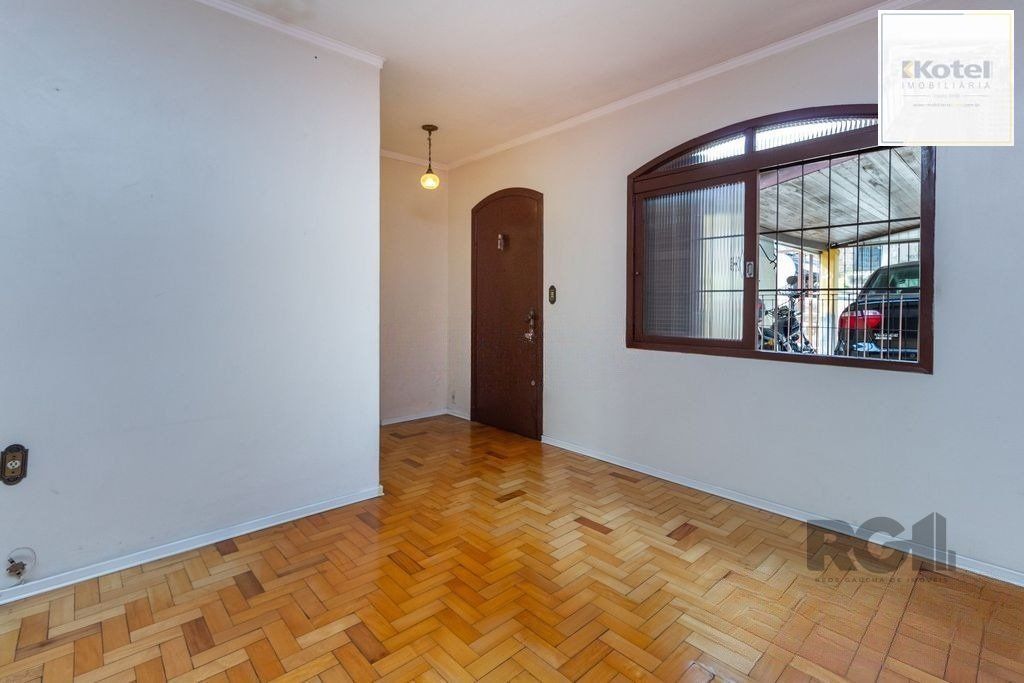 Casa de 4 dormitórios no bairro Camaquã — foto 2